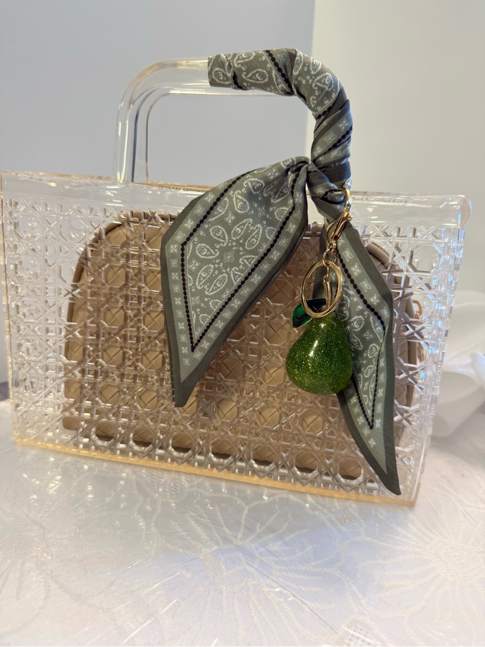 Clear Jelly  Mini Bag with Green Scarf Handle and Green Pear Charm, cosmetic bag